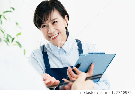 Middle-aged women checking their nutritional balance 127740975