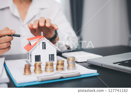 Concept business house finance protection office plan investment buy sell home ensuring idea financial security. residence agent hand protect purchase insurance and secure favorable loan deal. Concept business house finance protection office plan investment buy sell home ensuring idea financial security. residence agent hand protect purchase insurance and secure favorable loan deal. 127741182