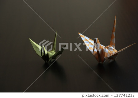 Folded paper crane Folded paper crane 127741232