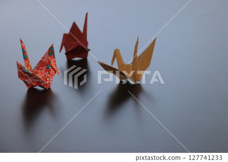 Folded paper crane Folded paper crane 127741233