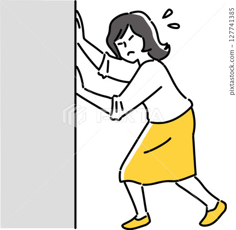 Woman pushing a wall 127741385