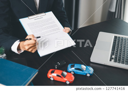 Concept business vehicle finance protection office plan investment buy sell car ensuring idea financial security. automobile agent hand protect purchase insurance and secure favorable loan deal. 127741416