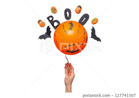 Handheld orange balloon with Halloween decor, isolated on white, PNG 127741507