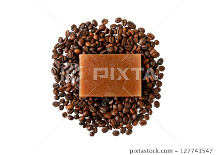 Rich coffee soap set amidst roasted coffee beans, isolated on white, PNG Rich coffee soap set amidst roasted coffee beans, isolated on white, PNG 127741547