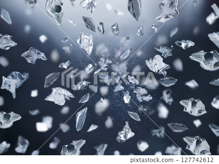 Small ice cubes flying with great force 127742612