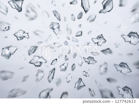Small ice cubes flying vigorously on a white background 127742613
