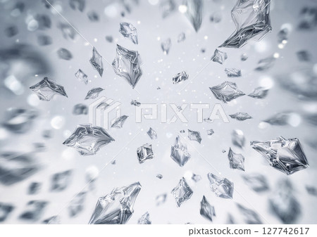 Ice flying violently on white background 127742617