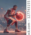 A basketball player in a powerful stance, holding a glowing basketball surrounded by flames, with a dramatic red moon in the background. Motivational concept for basketball enthusiasts. 127743155