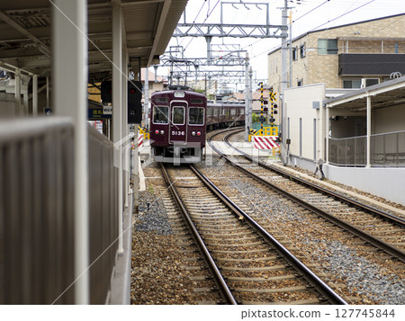 Train passing through the station Train passing through the station 127745844