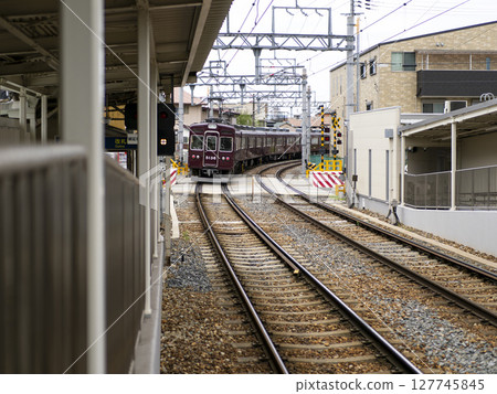 Train passing through the station Train passing through the station 127745845