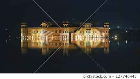 Jaipur, Rajasthan, India. Jal Mahal Or Water Palace In Night Illumination. Palace Inmiddle Of Man Sagar Lake. Was Originally Constructed Around 1699. Jal Mahal Palace Is Architectural Showcase Of Jaipur, Rajasthan, India. Jal Mahal Or Water Palace In Night Illumination. Palace Inmiddle Of Man Sagar Lake. Was Originally Constructed Around 1699. Jal Mahal Palace Is Architectural Showcase Of 127746443
