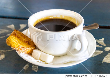 Fine Cup of Coffee on Wooden Table with Cookie Belarus. Fine Cup of Coffee on Wooden Table with Cookie Belarus. 127746875