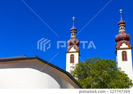 Barbara church cathedral Barbarakirche Fliess with blue sky Tyrol Austria. 127747269