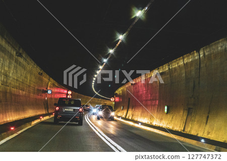 Driving through a tunnel in the mountains in Vorarlberg Austria. 127747372