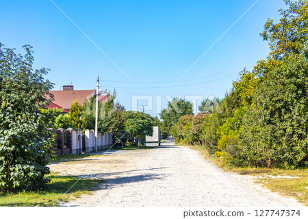 Walking in nature countryside on forest path trail Brest Belarus. 127747374