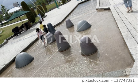 #Children playing in the park 127747381