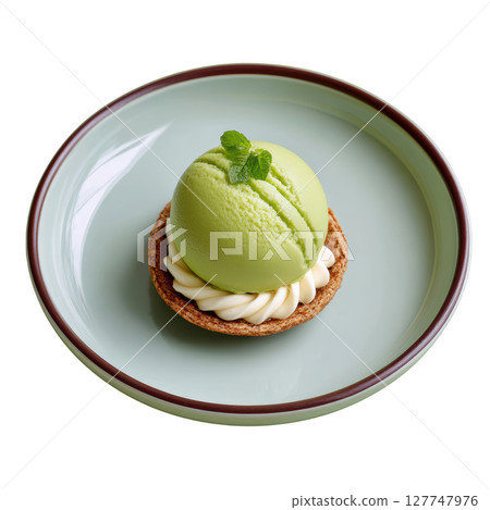 Delicious Matcha Dessert with Creamy Topping in Elegant Plating on a Soft Green Plate 127747976