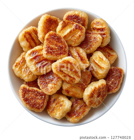 Golden Brown Gnocchi Served in a Bowl, Delicious Potato Dumplings with a Crispy Texture, Ideal for Culinary Inspiration 127748028