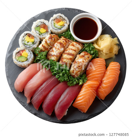 Exquisite Sushi Platter with Assorted Fish, Rolls, Sauce, and Garnish on Slate Serving Board 127748085
