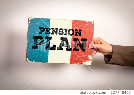 Pension Plan Concept with French Flag Sign Held by Hand on Neutral Background 127748402