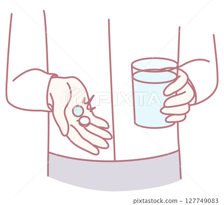 A Person Taking Medication with Water as Part of Their Daily Health Management Routine 127749083
