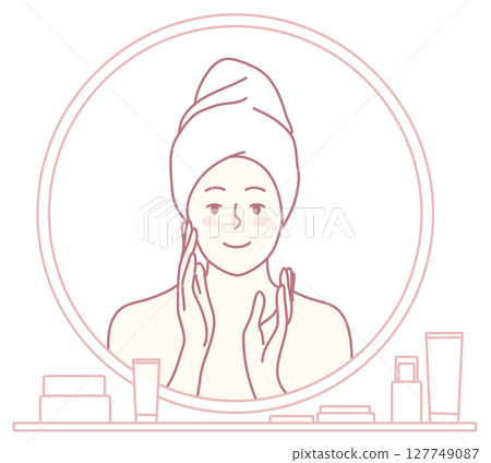Performing a Skincare Routine in Front of a Mirror for a Refreshed Appearance and Glow 127749087