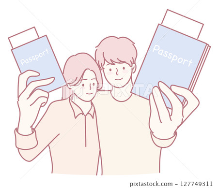 A group of Young Travelers joyfully Holding their Passports Together for their adventure abroad 127749311