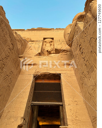 Abu Simbel Great Temple, relief above the entrance and on the side of the stone statue, World Heritage Site 127749600