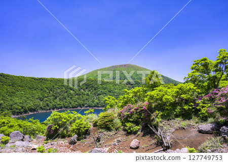 View of Mt. Karakunidake from the deep green of Onami Pond View of Mt. Karakunidake from the deep green of Onami Pond 127749753