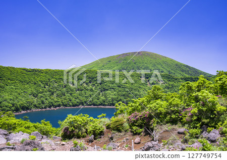 View of Mt. Karakunidake from the deep green of Onami Pond View of Mt. Karakunidake from the deep green of Onami Pond 127749754