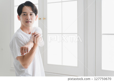 Young man wearing a T-shirt Lifestyle image 127750670