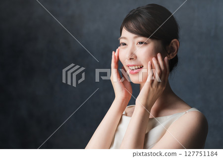 Young woman doing skin care beauty image 127751184