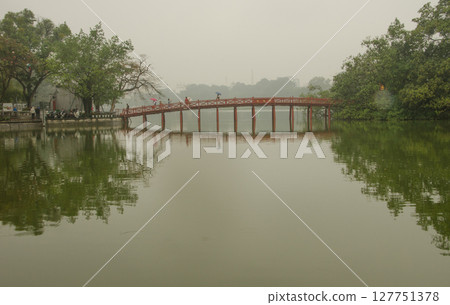 The Huc Bridge on Hoan Kiem Lake. The Huc Bridge on Hoan Kiem Lake. 127751378