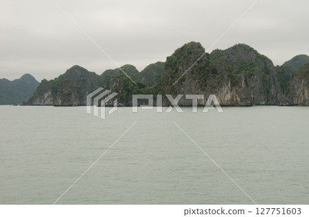 Limestone cliffs in Lan Ha Bay. Limestone cliffs in Lan Ha Bay. 127751603
