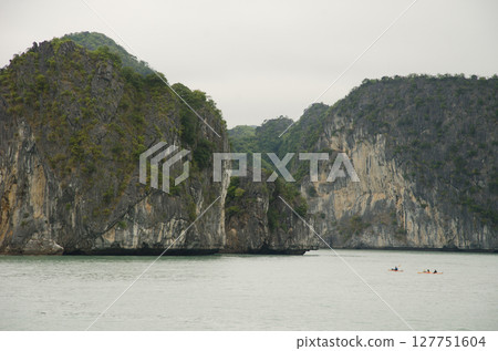 People kayaking in Lan Ha Bay. 127751604