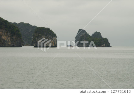 Limestone cliffs in Lan Ha Bay. 127751613