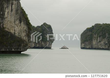 Limestone cliffs in Lan Ha Bay. Limestone cliffs in Lan Ha Bay. 127751620