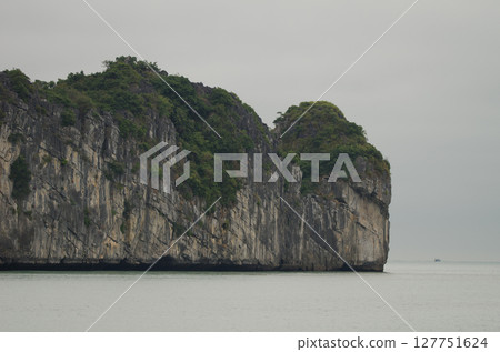 Limestone cliff in Lan Ha Bay. Limestone cliff in Lan Ha Bay. 127751624