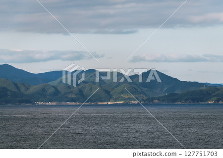 [Tokyo Kyushu Ferry bound for Mayu Shinmoji sails off the coast of Cape Ashizuri] 127751703