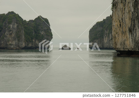 Limestone cliffs in Lan Ha Bay. Limestone cliffs in Lan Ha Bay. 127751846