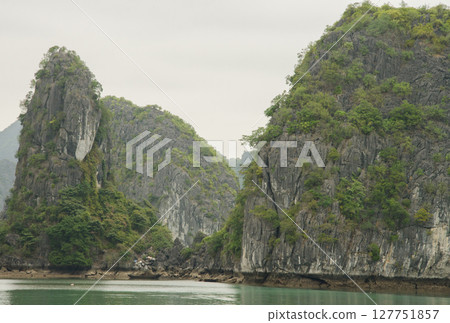 Limestone cliffs in Lan Ha Bay. Limestone cliffs in Lan Ha Bay. 127751857