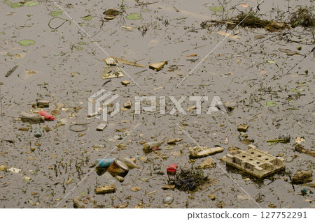 Garbage in a lagoon. Garbage in a lagoon. 127752291