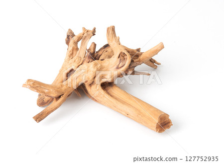 Dry driftwood isolated on white background, natural decorative element for aquariums or interior design. 127752935
