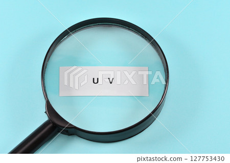 UV and magnifying glass 127753430