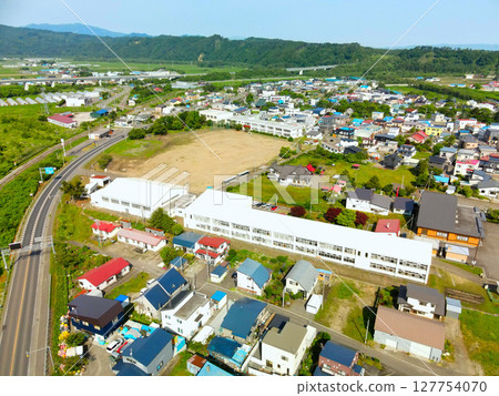 Aerial view of Ochibe Junior High School in Yakumo Town, Hokkaido in early summer Aerial view of Ochibe Junior High School in Yakumo Town, Hokkaido in early summer 127754070