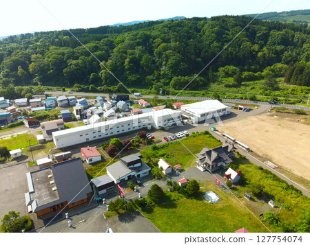 Aerial view of Ochibe Junior High School in Yakumo Town, Hokkaido in early summer Aerial view of Ochibe Junior High School in Yakumo Town, Hokkaido in early summer 127754074