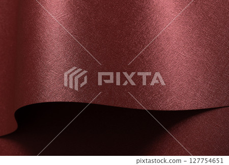 Chic paper background in red and marsala. Pearlescent metallic surface with glossy folds, wavy Chic paper background in red and marsala. Pearlescent metallic surface with glossy folds, wavy 127754651