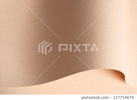 Elegant designer paper in beige and cream tones with rough grained texture and pierced surface. Elegant designer paper in beige and cream tones with rough grained texture and pierced surface. 127754674