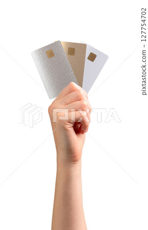 Hand holding a bank card for payment at a retail store, symbolizing finance, shopping, and digital Hand holding a bank card for payment at a retail store, symbolizing finance, shopping, and digital 127754702