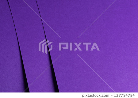 Premium designer paper in bright and dark violet purple tones with matte surface and elegant texture 127754784